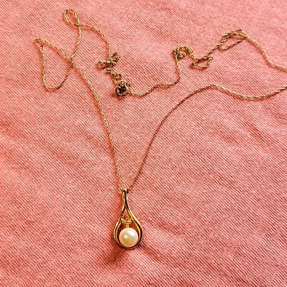 Stamped 14k chain and pendant.